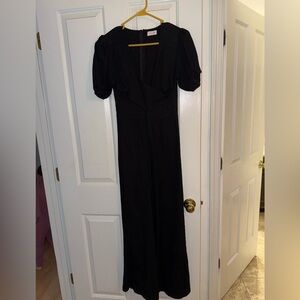 Pink Lily | black short sleeve jumpsuit with cut out detail, size M